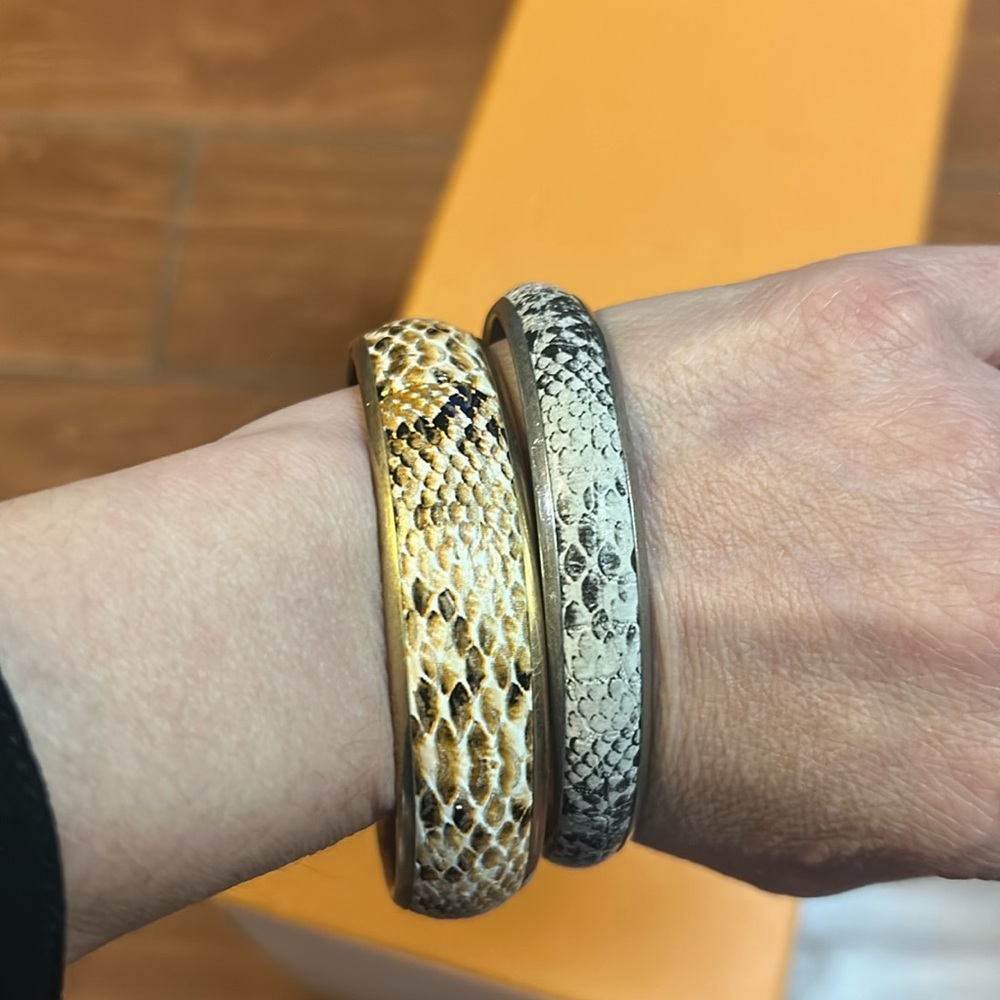Snakeskin and gold tone and silver tone bracelet